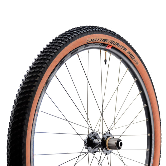 PNEU GRAVEL 27.5X2.10 TS DELI SA-270 QUANTA PRO ANTICREVAISON 1.3MM TT NOIR/MARRON (54-584